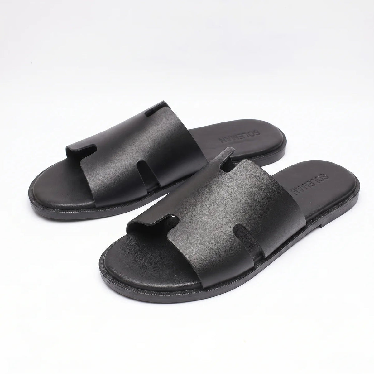 Slip into effortless luxury with the Hermès Slipper in Black. Crafted with premium materials and refined minimalist design, this iconic silhouette delivers comfort and sophistication for every mome...