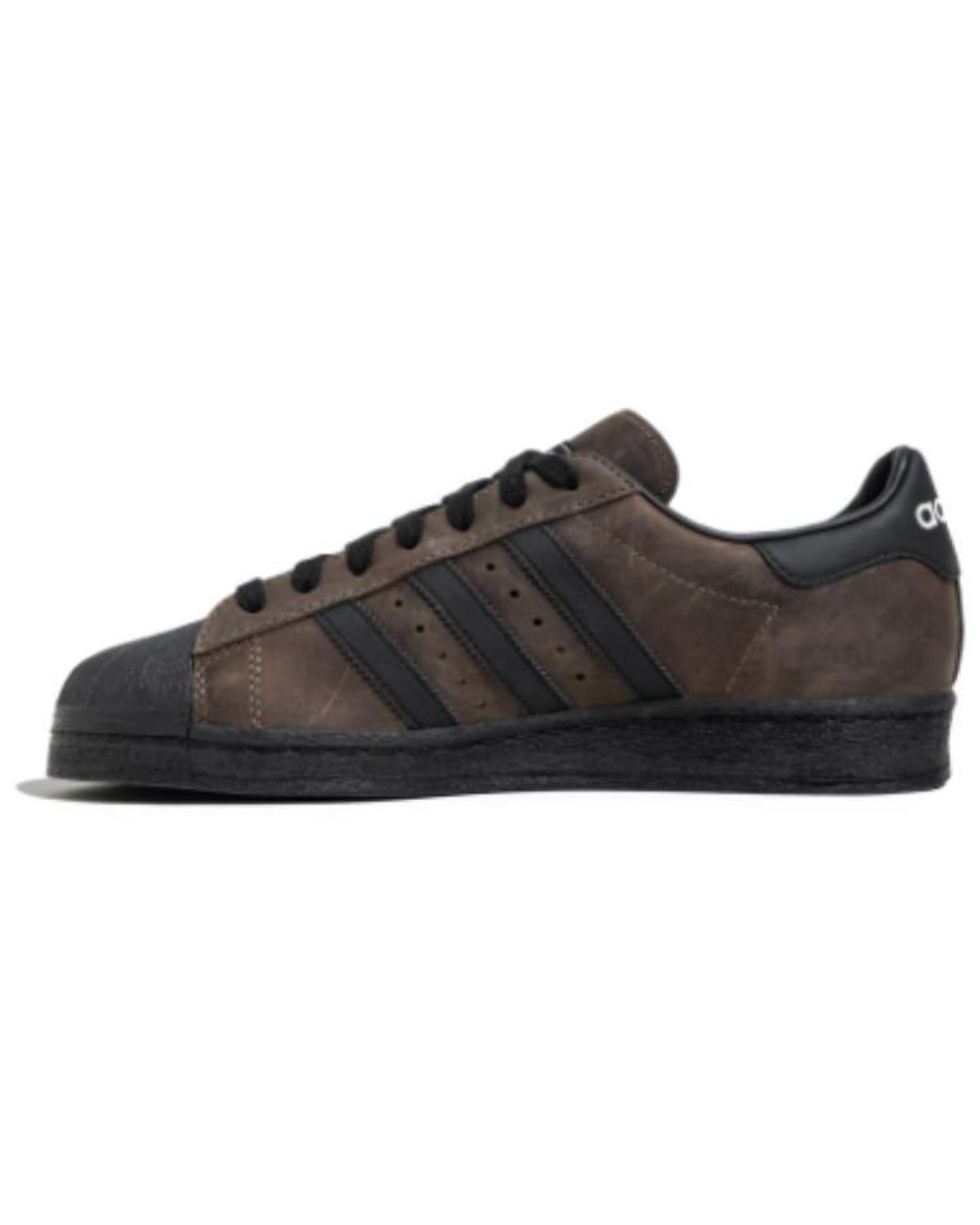 <h4 style="text-align: center;"><strong>Premium brown suede superstar sneaker crafted with meticulous attention to detail. Classic silhouette meets contemporary comfort with a rich, luxurious finish. Perfect for elevating everyday streetwear or making a bold statement. Versatile enough for casual outings or styled editorial looks. Built to last with quality construction that stands out in any collection.</strong></h4>