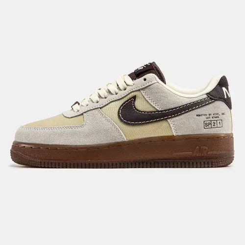 <h4 style="text-align: center;">The shoe in the image appears to be the Nike Air Force 1 Low "Coffee" model, crafted from suede and canvas materials in shades of coffee and beige, featuring the signature brown Swoosh.</h4>