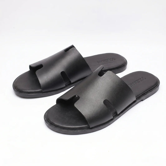 Slip into effortless luxury with the Hermès Slipper in Black. Crafted with premium materials and refined minimalist design, this iconic silhouette delivers comfort and sophistication for every mome...