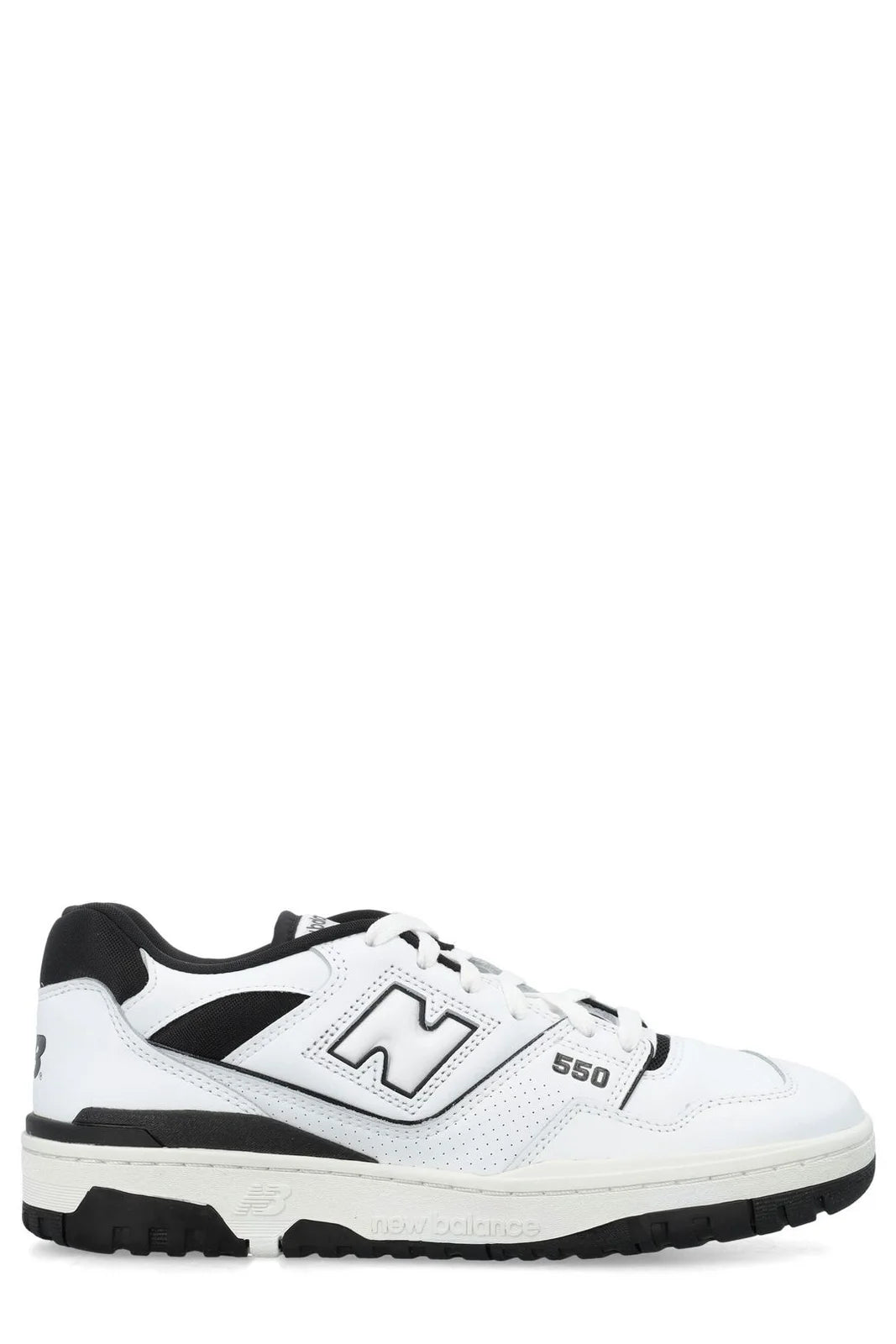 This appears to be a pair of New Balance 550 White Black sneakers featuring a classic low-top leather upper with contrasting black accents and the signature "N" logo on the side.