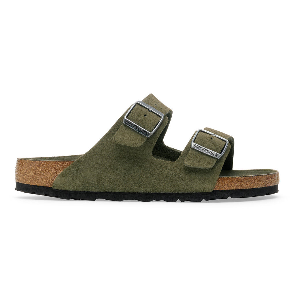 Leather upper
Leather insole
Rubber sole
Two-strap sandal design
Adjustable buckle straps
Contoured cork footbed
Open-toe style
Flat sole