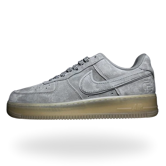 <h4 style="text-align: center;"><strong>The iconic Air Force 1 reimagined in rich dark gray suede. Premium craftsmanship meets timeless design with soft suede upper, reinforced toe cap, and the signature rubber sole. Perfect for elevating casual wardrobes with understated luxury and everyday versatility.</strong></h4>