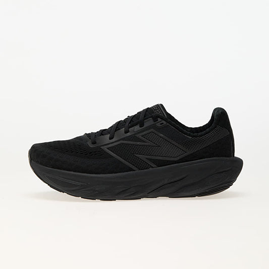 This appears to be a black New Balance Fresh Foam X athletic running shoe featuring a textured mesh upper and chunky cushioned sole.