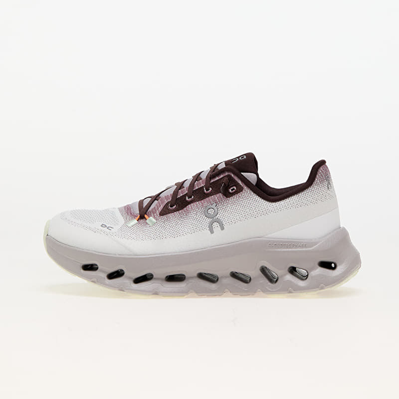 The image shows a pair of On Running Cloudtilt sneakers in a light grey and white colorway featuring a speed-lacing system and size 45 labeling.