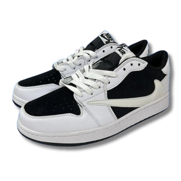 <h4 style="text-align: center;">The Travis Scott White &amp; Black sneaker merges bold streetwear aesthetics with iconic silhouette design. Featuring crisp white leather paired with striking black accents, this collectible delivers premium construction and distinctive styling perfect for elevated casual wear. A must-have for sneaker enthusiasts who demand both heritage craftsmanship and contemporary edge.</h4>