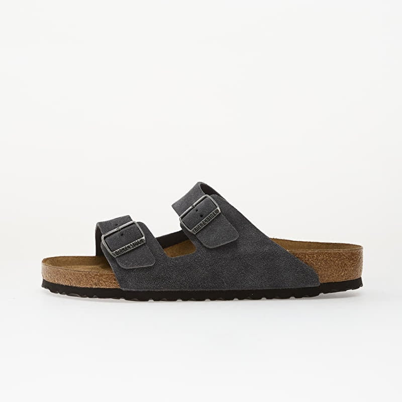 Leather upper
Leather insole
Rubber sole
Two-strap sandal design
Adjustable buckle straps
Contoured cork footbed
Open-toe style
Flat sole