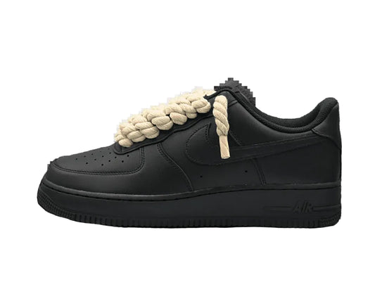 <h4 style="text-align: center;"><strong>Iconic silhouette meets premium craftsmanship. The Air Force 1 in black leather with striking beige rope laces delivers timeless style and uncompromising comfort. A versatile essential that transitions seamlessly from court to street, anchoring any rotation with understated sophistication.</strong></h4>